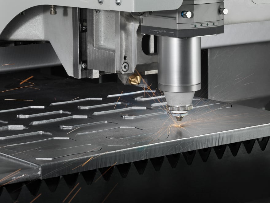 Cutting head of sheet laser cutting systems